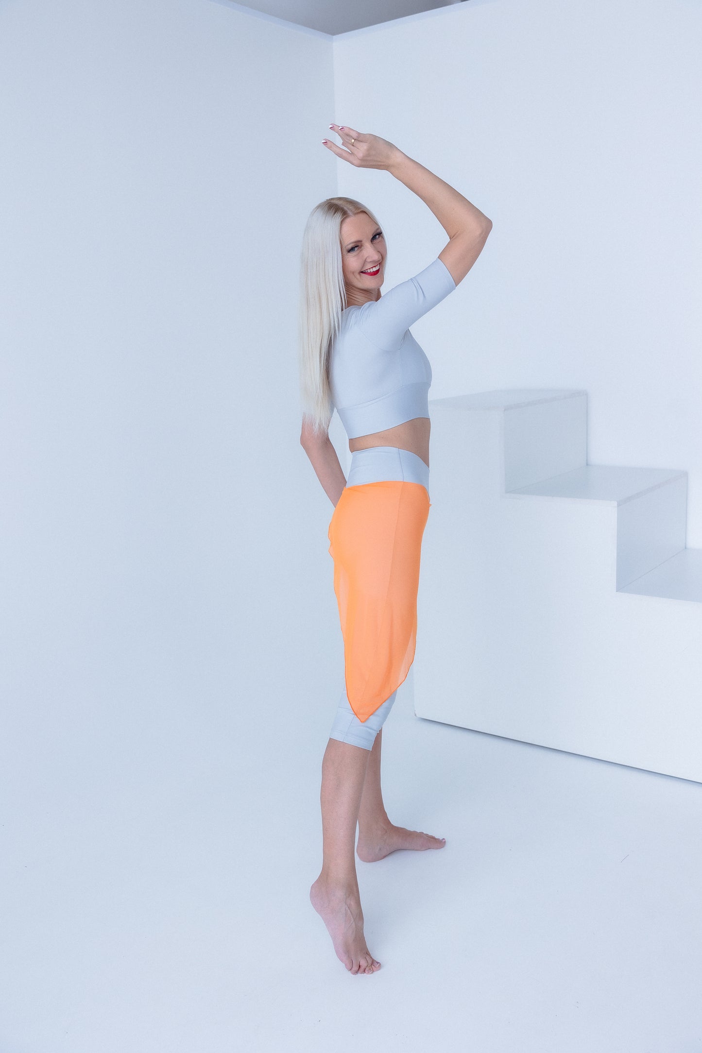 BONNA “Star Arrow” gaiši pelēki kapri legingi ar tīkla pārklājumu 
